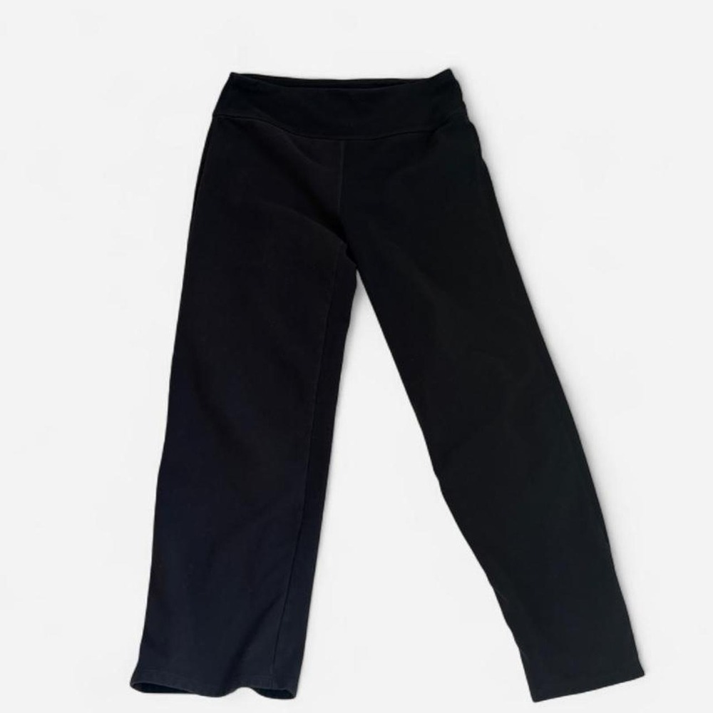 Black high-waisted leggings in size M